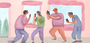 Personas mirando sus celulares